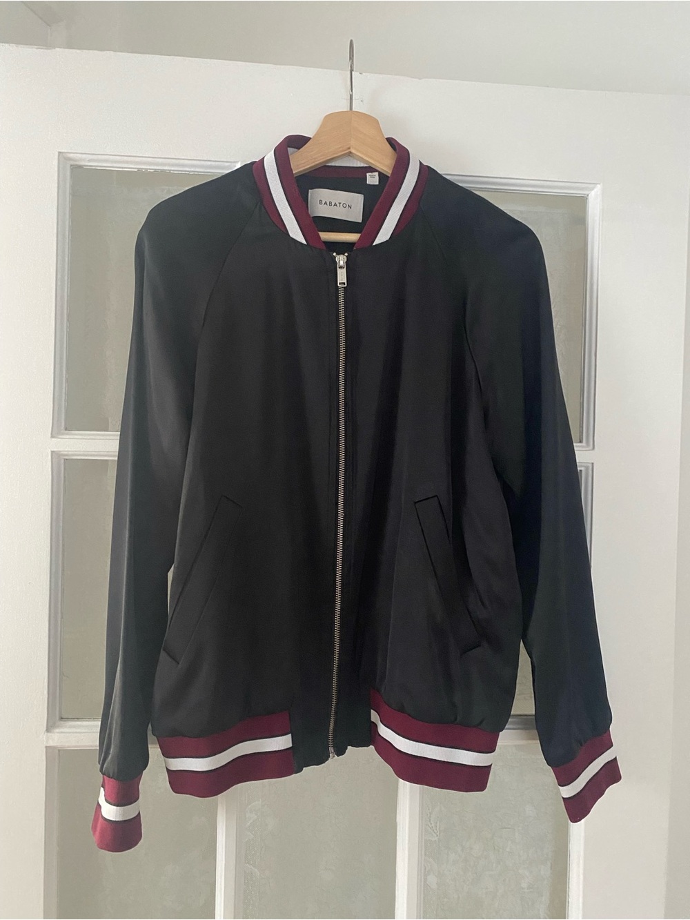 Babaton Black Bomber Jacket with Burgundy and White Striped Trim